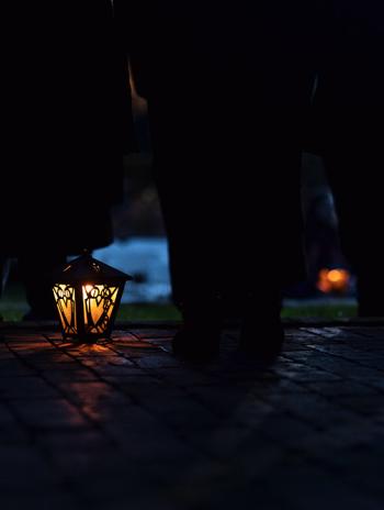 A lit lantern at Lux Doctorum