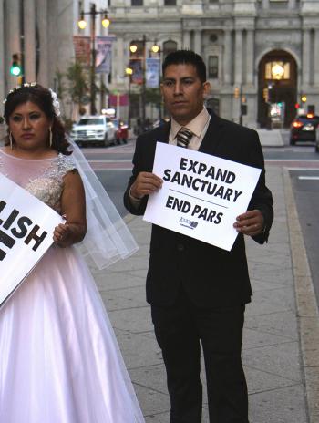 Protesters in wedding clothes 