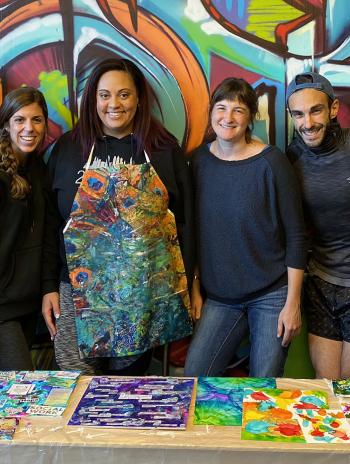 GSSWSR Lecturer Meagan Corrado (center) and students from her "Social Work, Trauma, and the Arts" course.