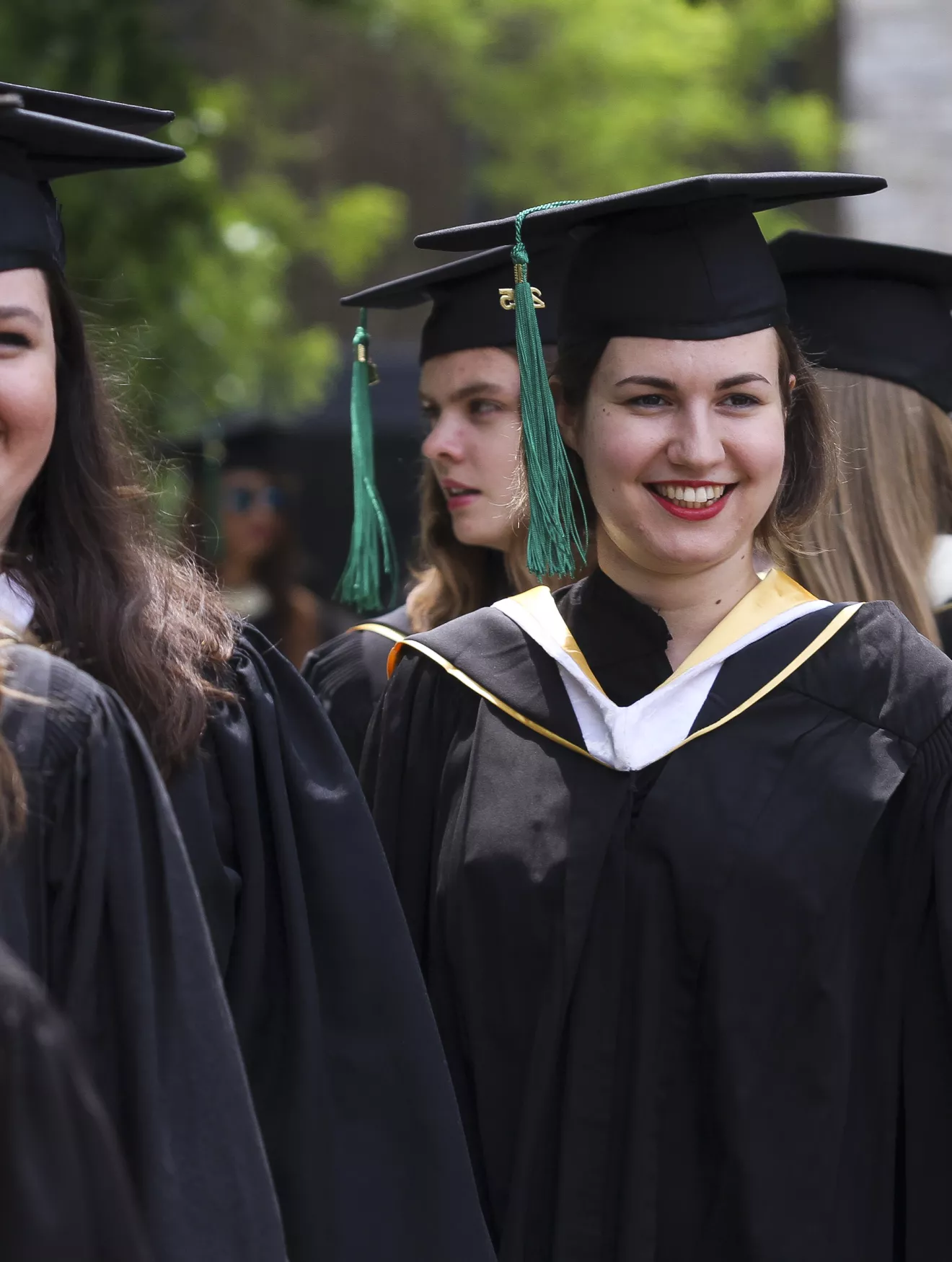 students in graduation gowns