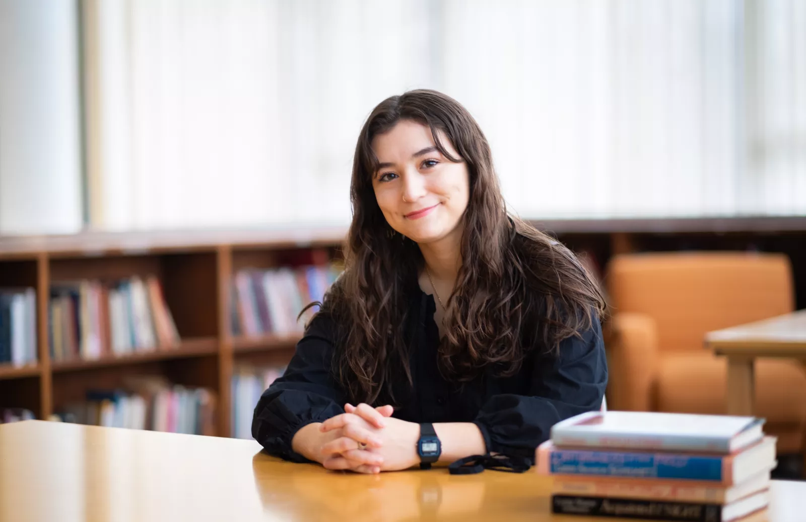 Zoe Kaufmann at a library desk