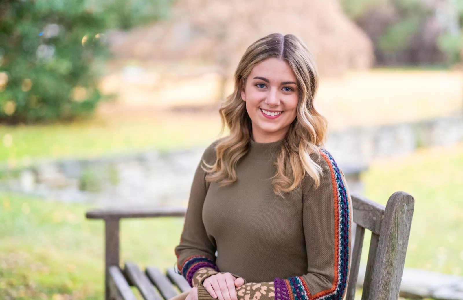 Regan Riehl sitting on a bench