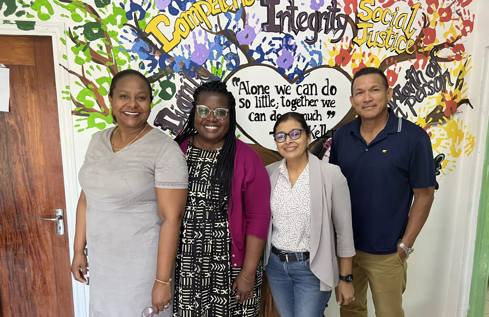 Tamarah Moss with University of Belize faculty