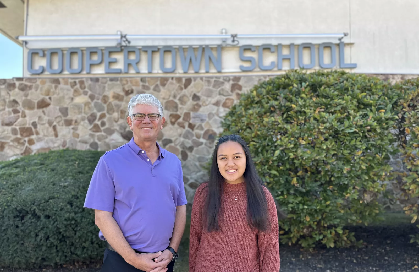 Victor Donnay and Kris Pasia outside of Coopertown Elementary
