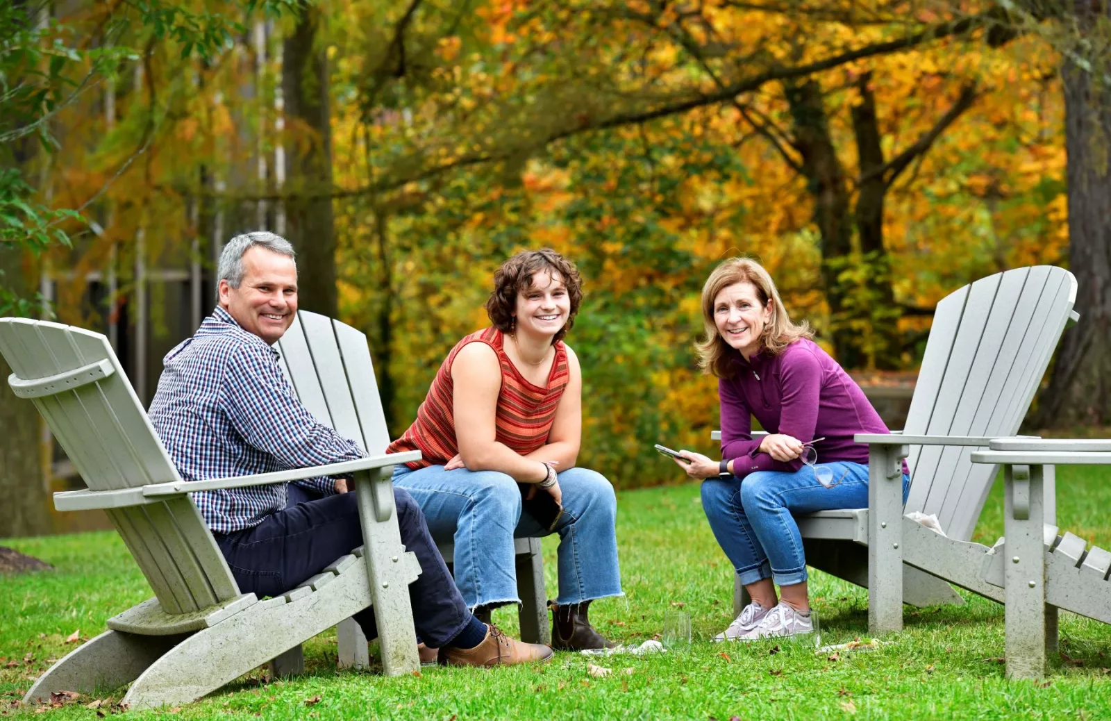 BMC family sitting in chairs outside