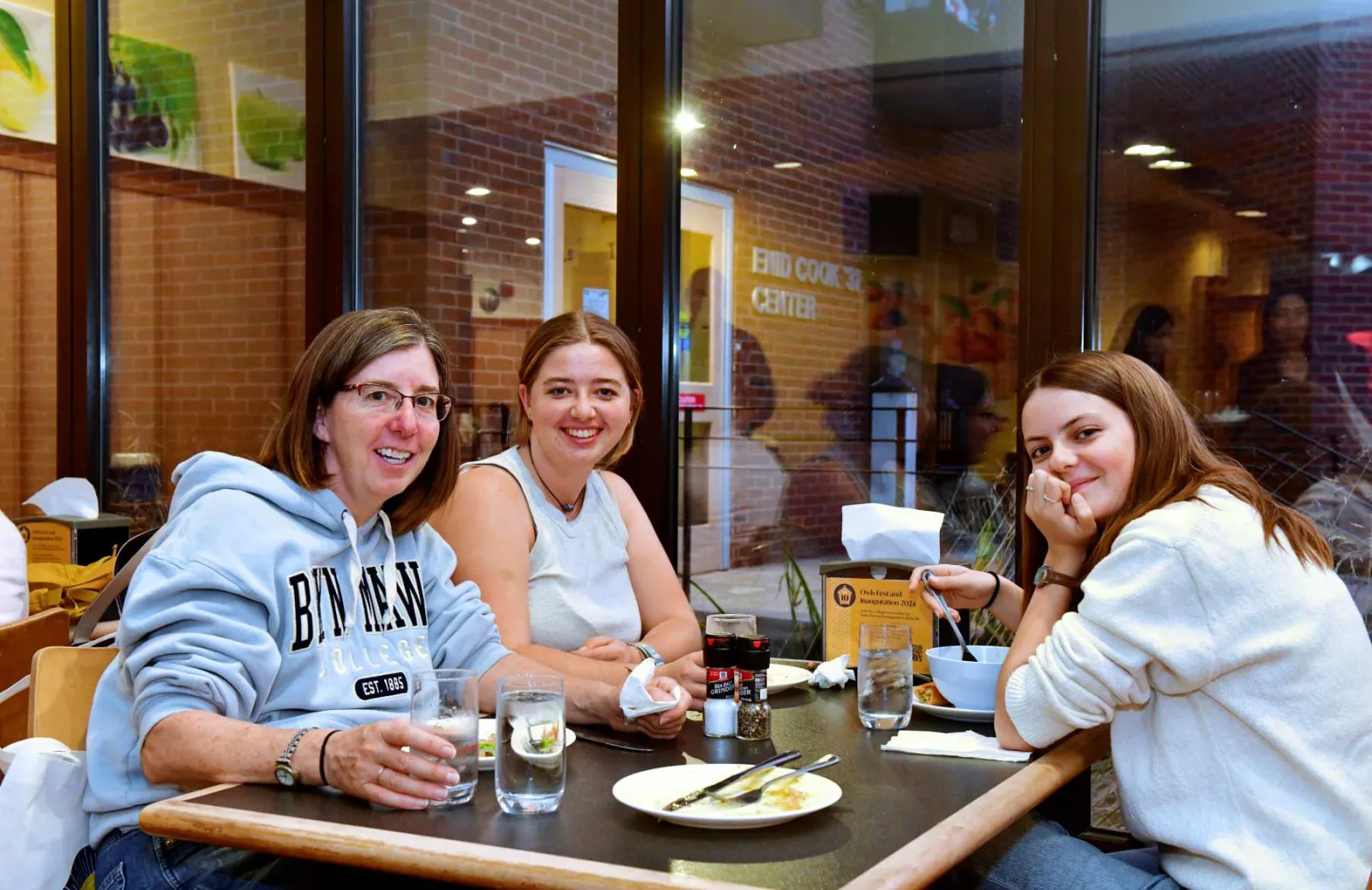 People sitting at a table eating