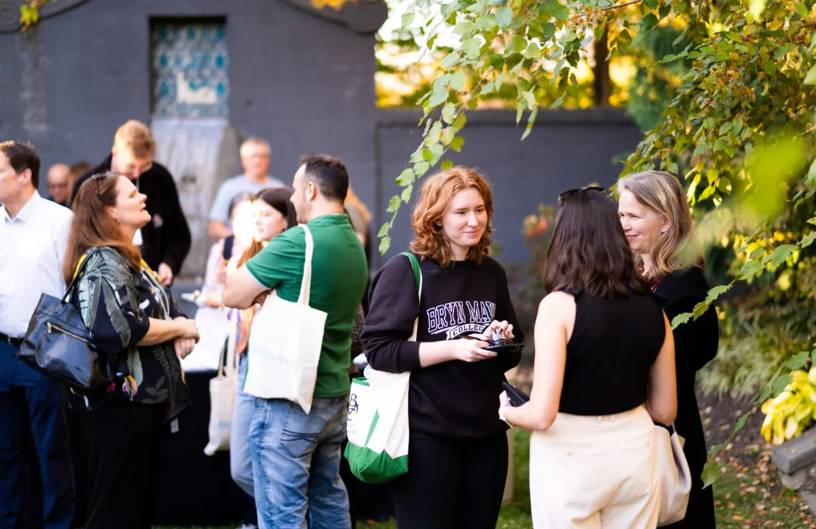 People talking in a garden