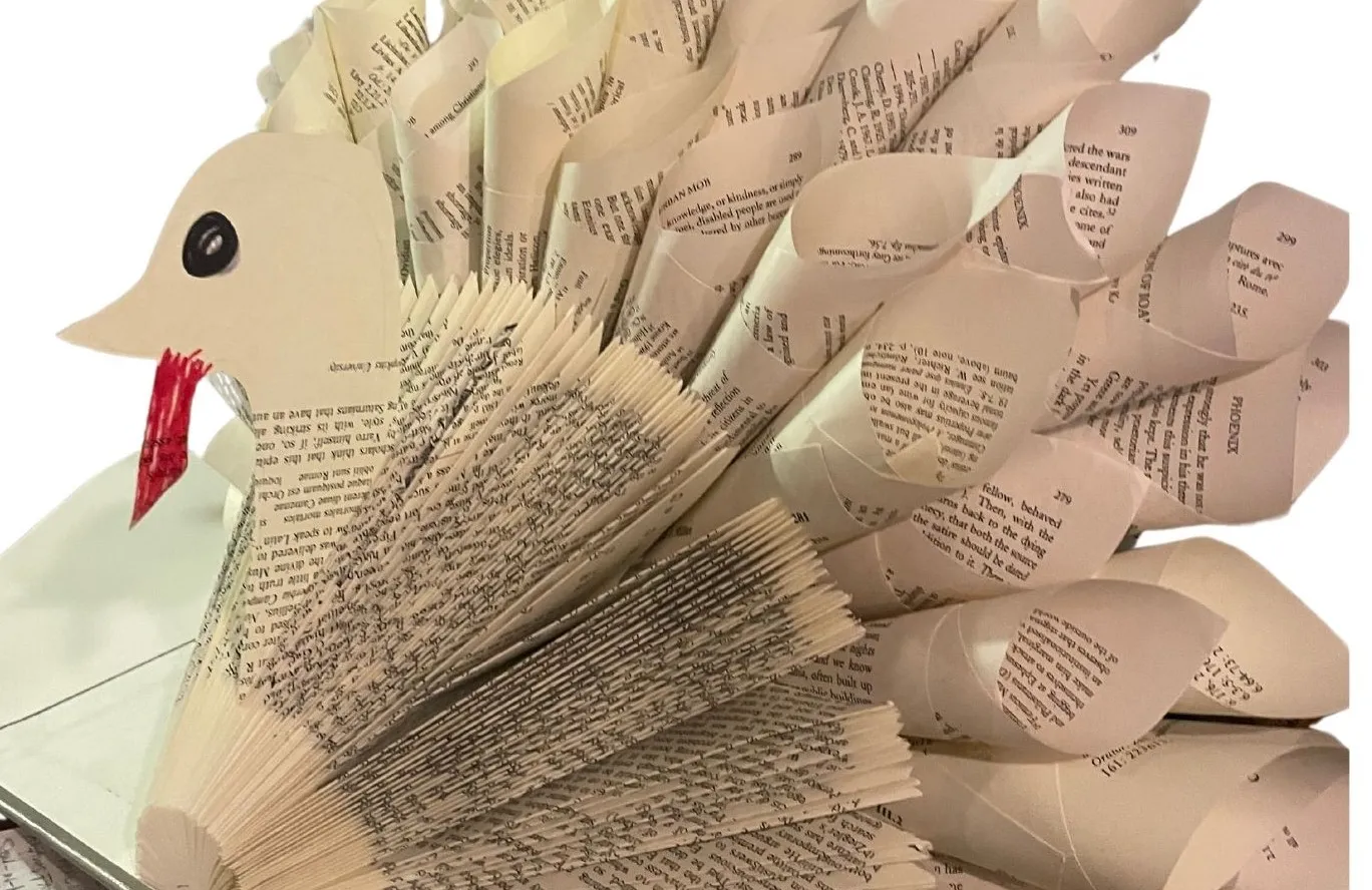 image of turkey made out of an old book