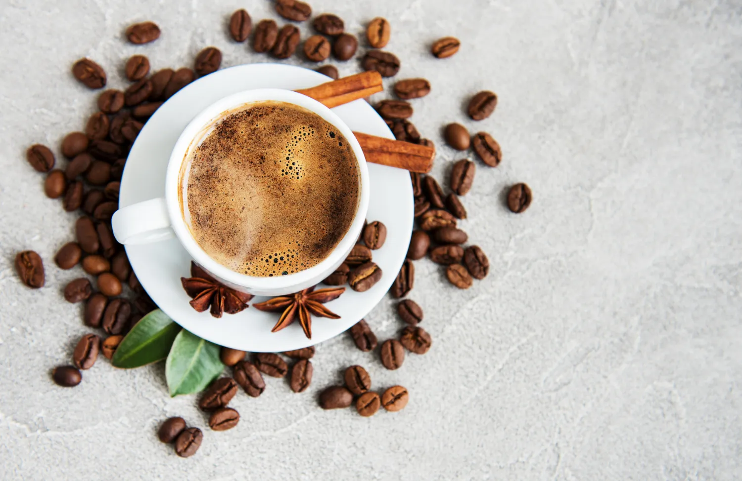 Coffee with coffee beans scattered