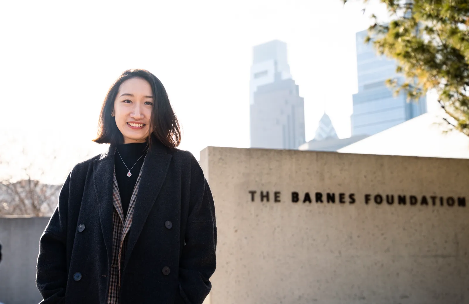Yuzhu standing in front of the Barnes Foundation