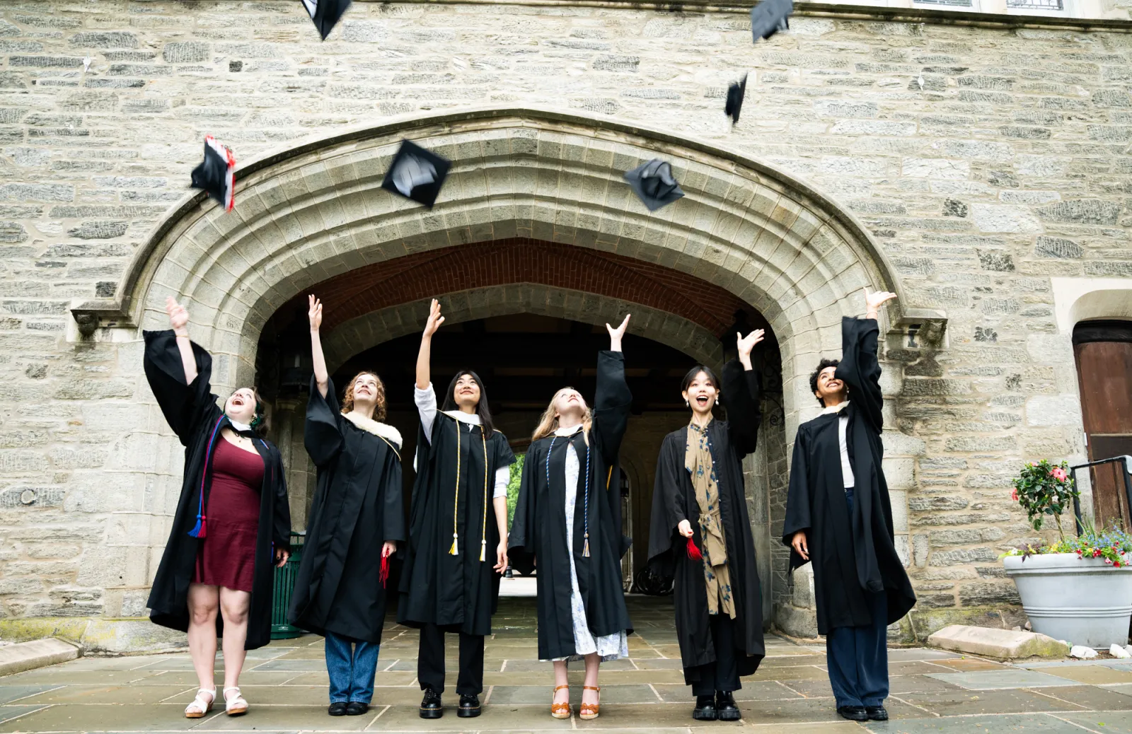 Students throwing caps in the air
