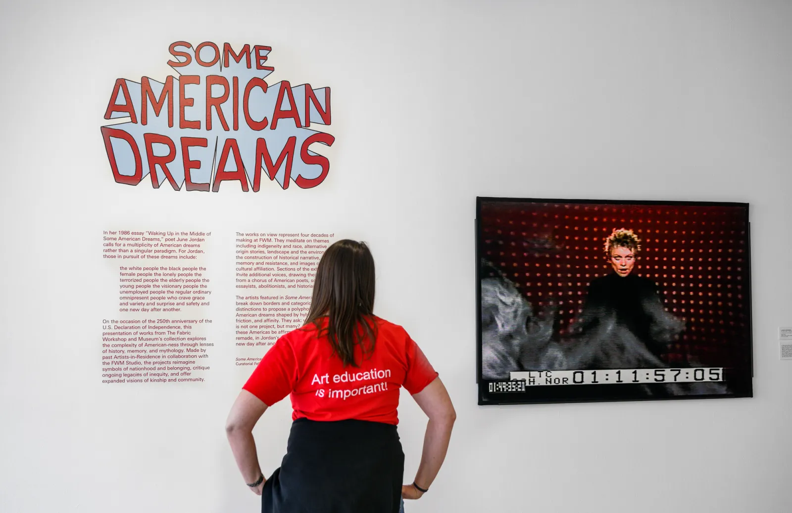 woman at art exhibit