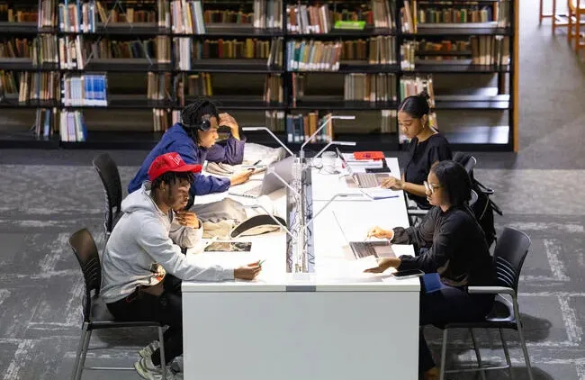 Students studying in a library