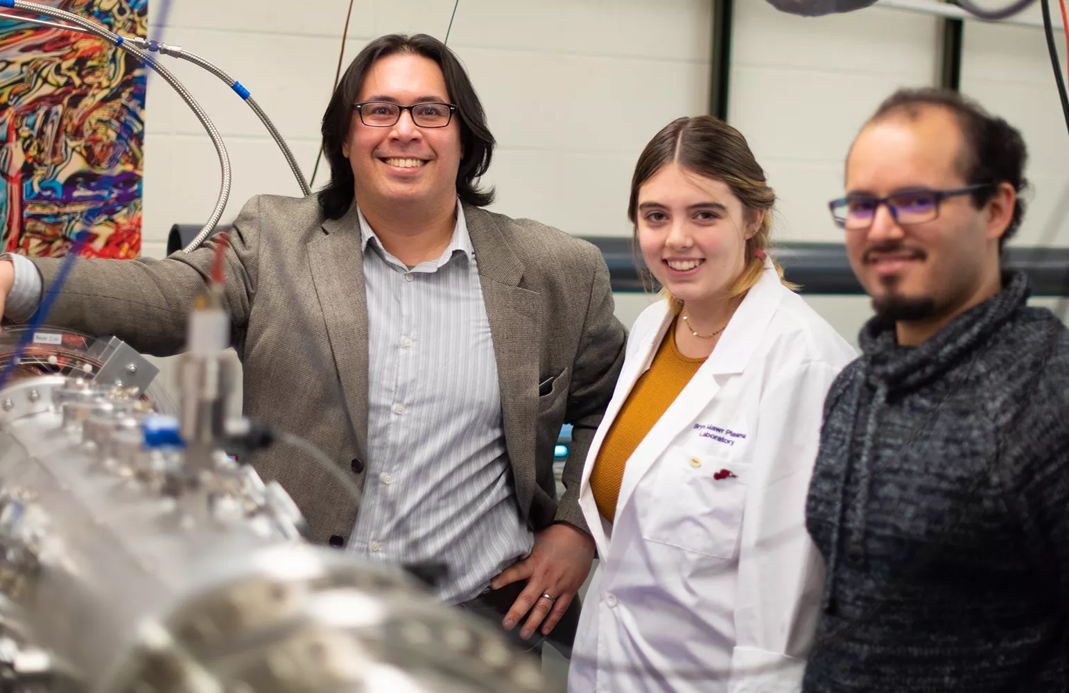 Assistant Professor of Physics David Schaffner (left), Maise Shepard '20, and Ph.D. Candidate Carlos Cartegena