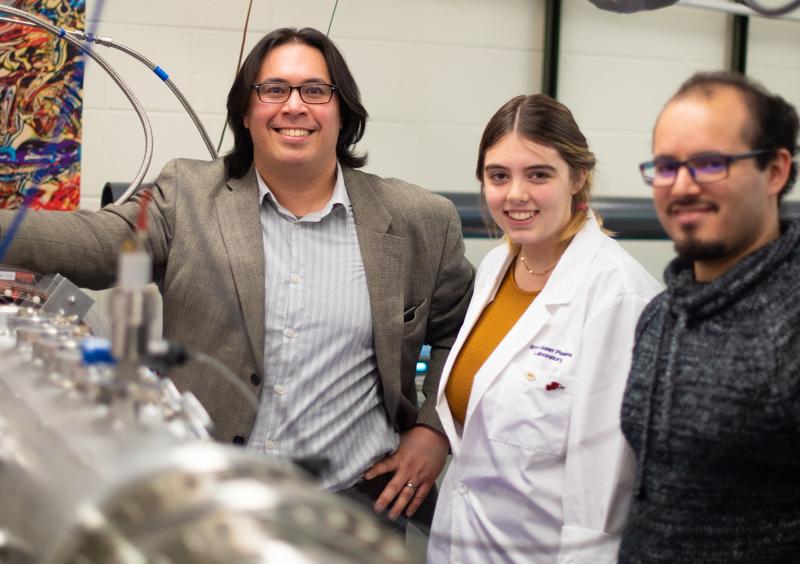 Assistant Professor of Physics David Schaffner (left), Maise Shepard '20, and Ph.D. Candidate Carlos Cartegena
