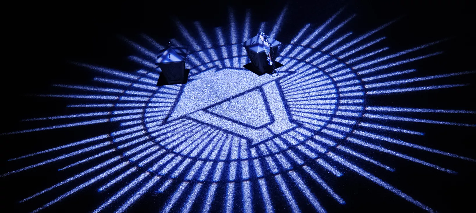 lantern and logo at night