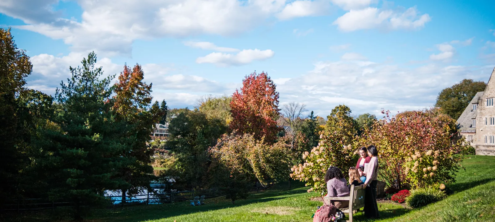 Students sitting on a bench 