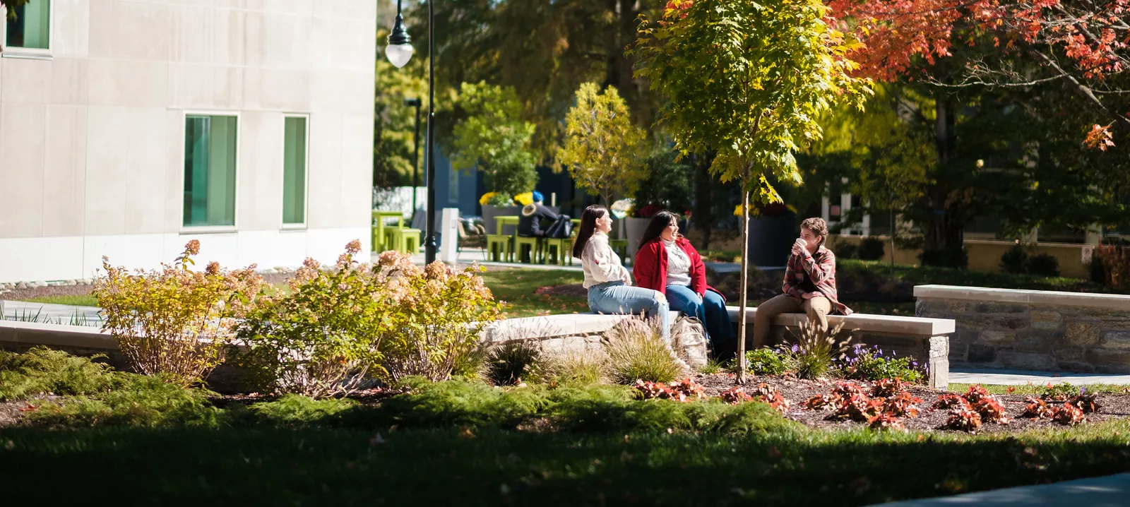 The Well exterior with students 