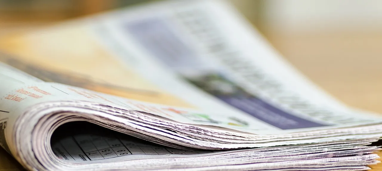 Newspaper on table