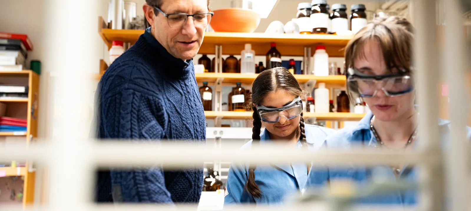 students and faculty in the lab
