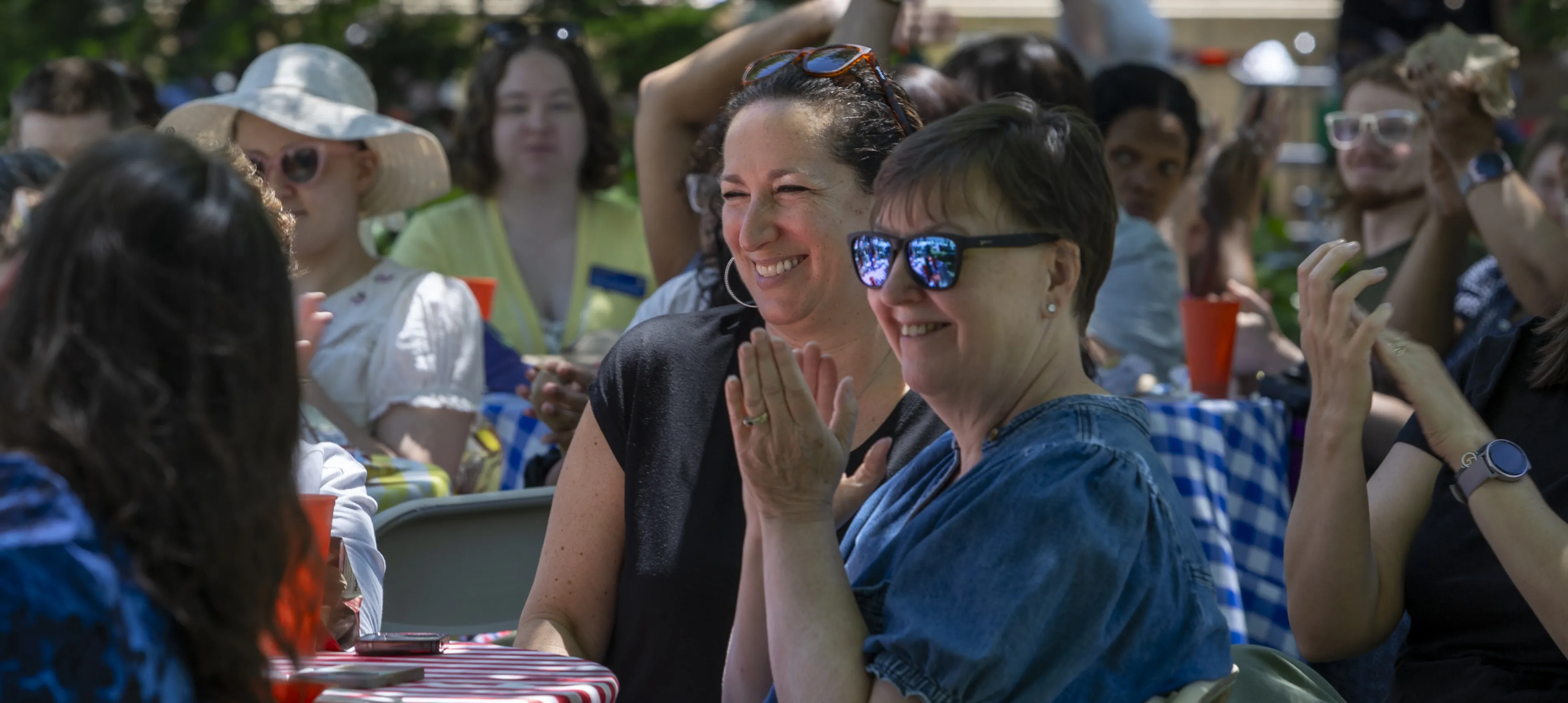 staff clapping for award winners