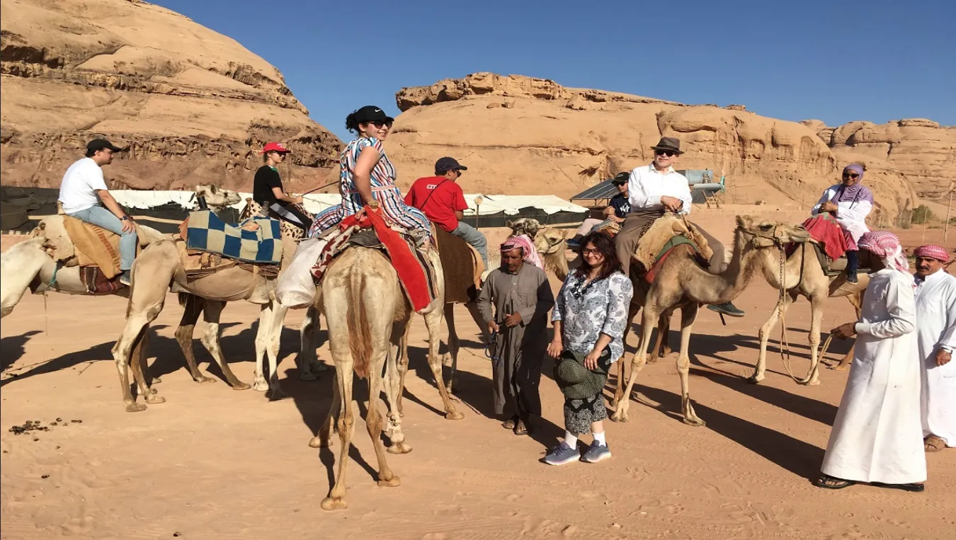 Bryn Mawr College Students abroad ride camels in Jordan