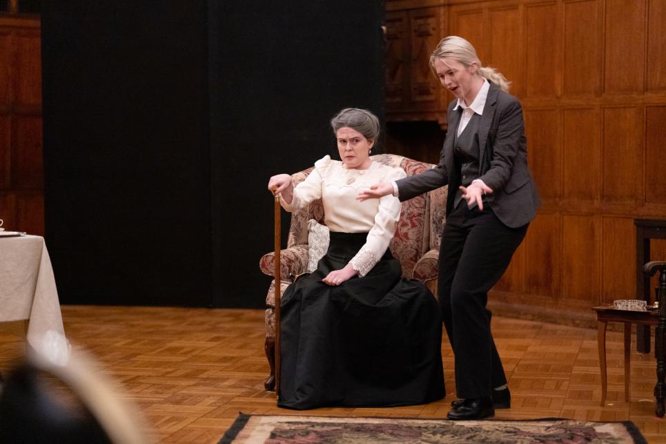 Jack tries to impress the mother of his potential betrothed, Lady Bracknell (A.E. Shuff '22).