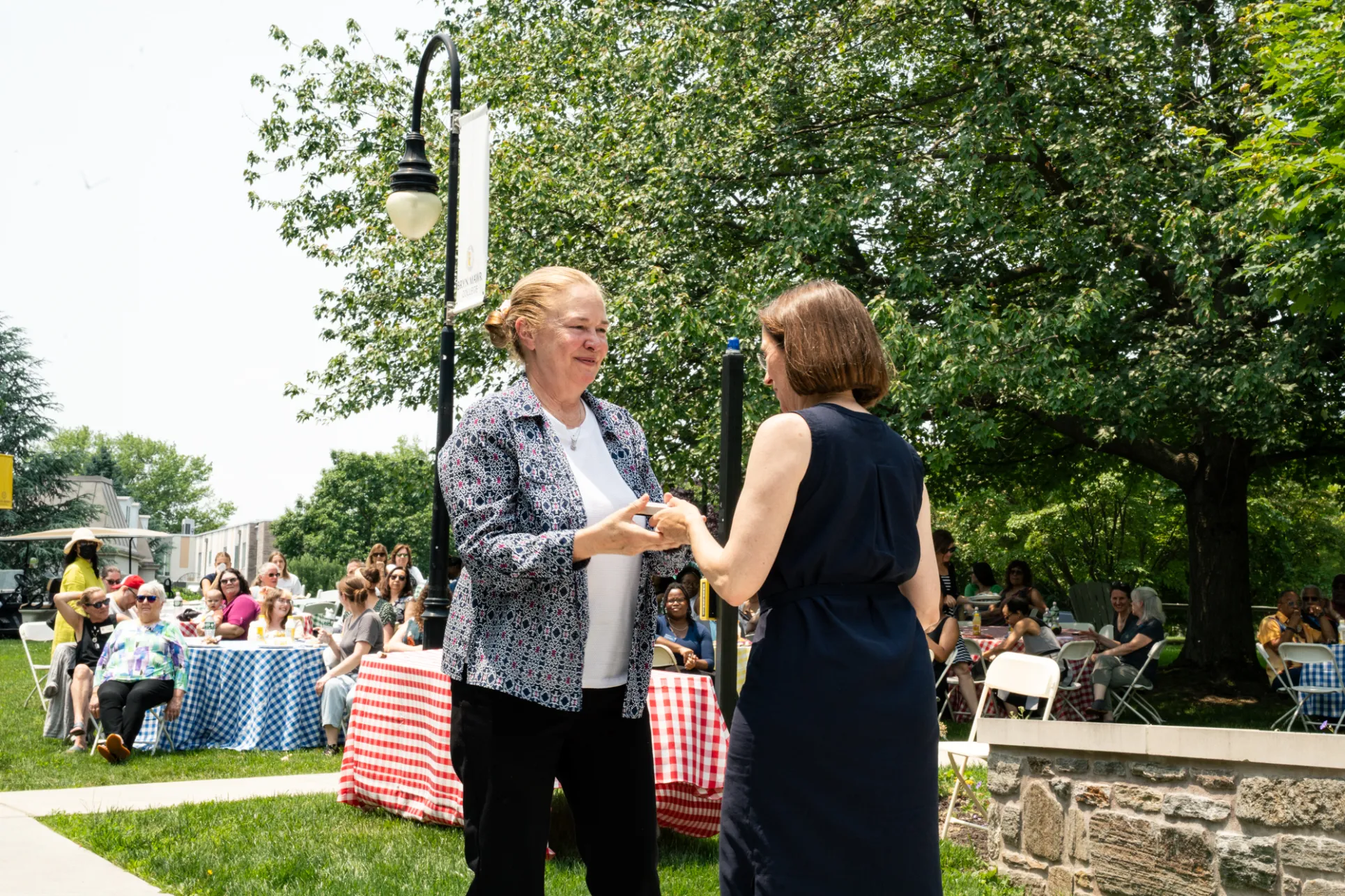 Staff Picnic 2025 - Staff member receiving award from Wendy