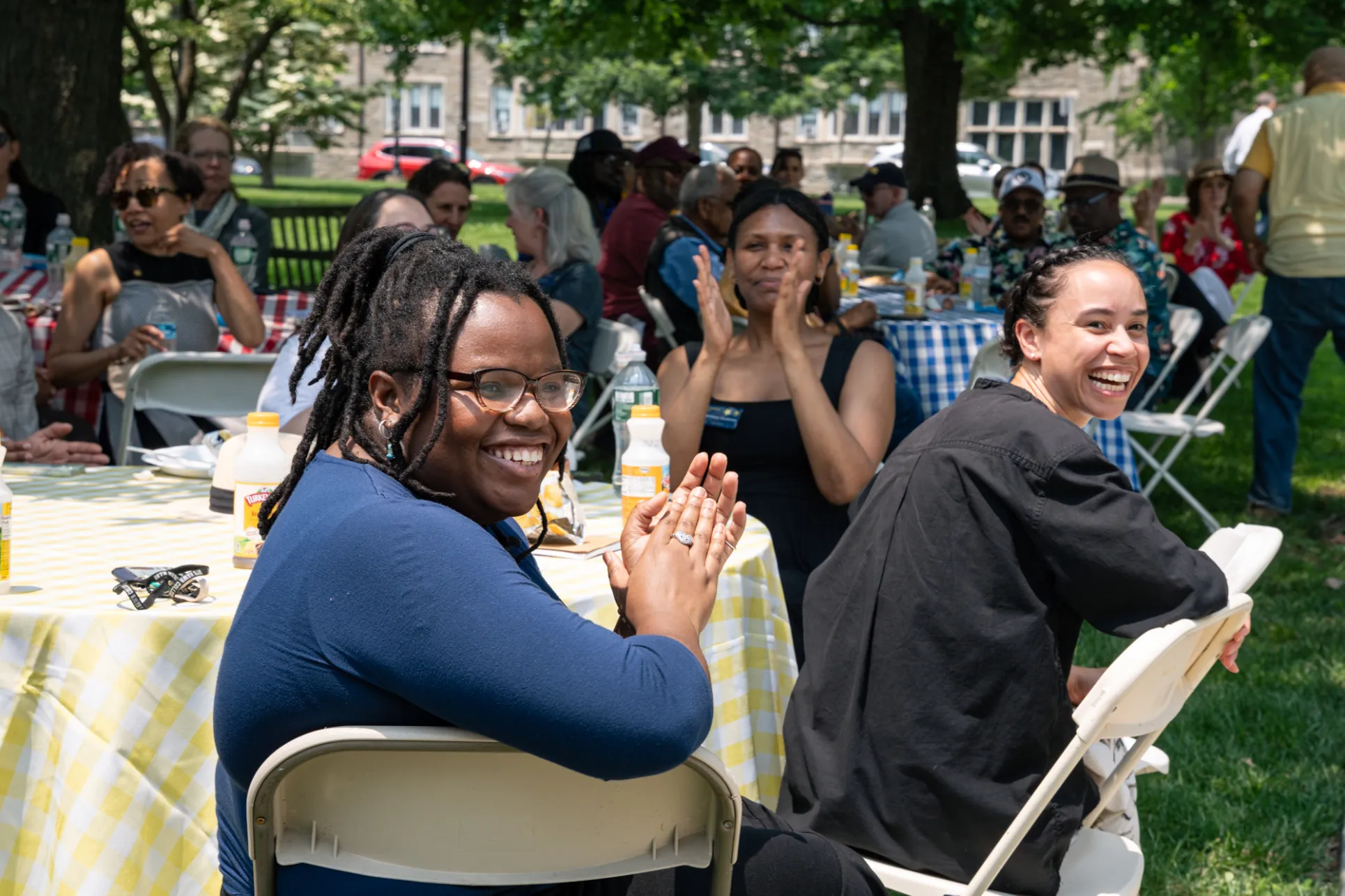 Staff laughing at the picnic