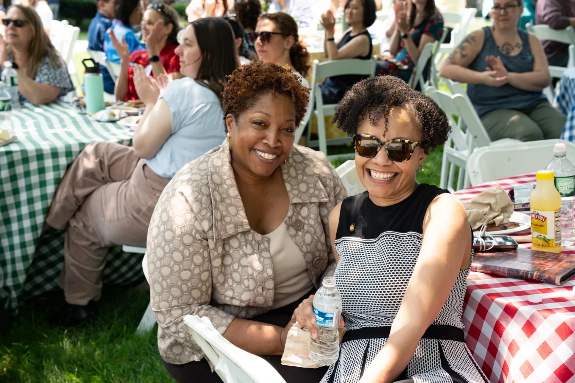 Staff smiling at the picnic