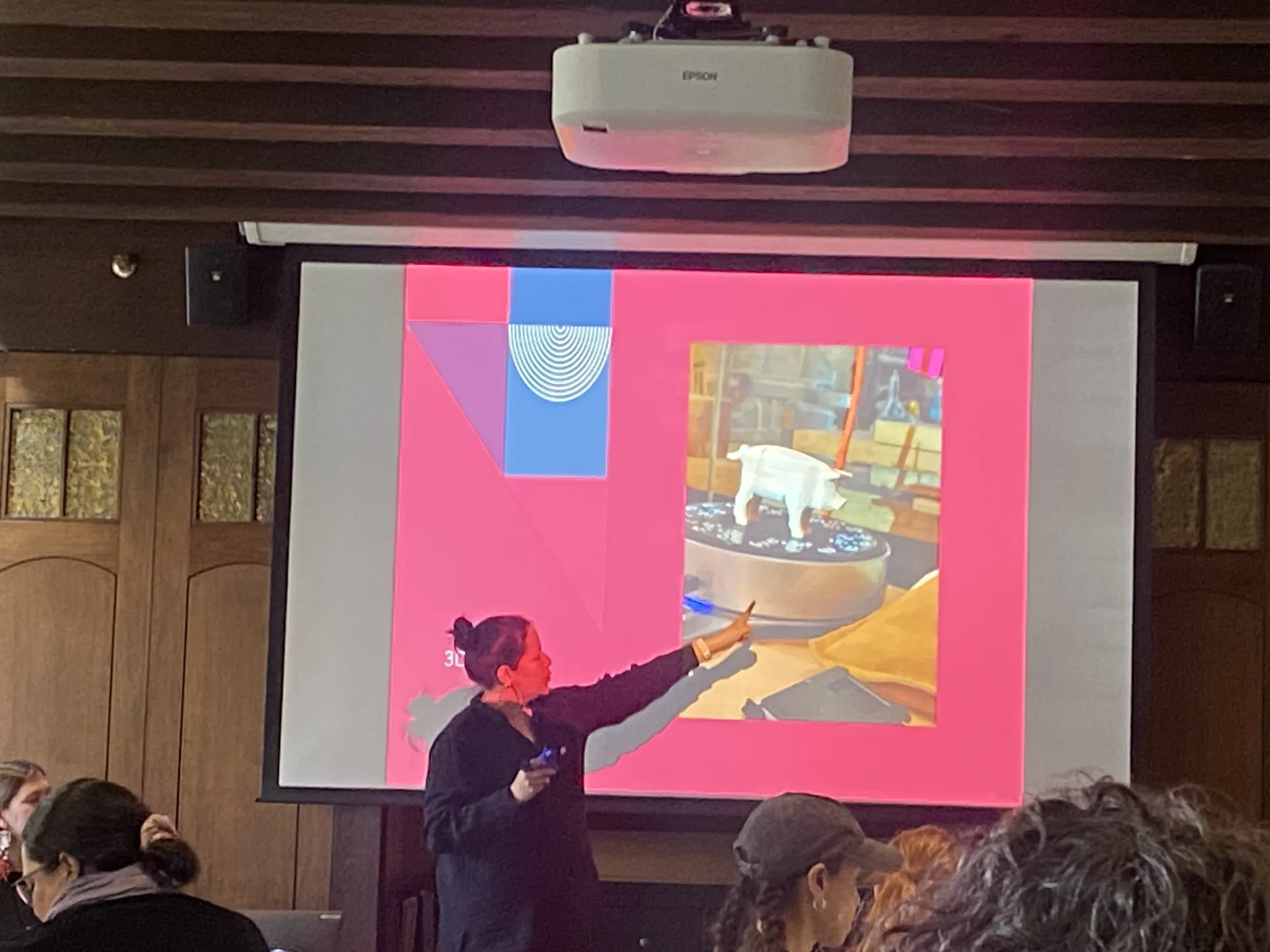 Illizt Castillo presents on 3D scanning, showing how she scanned a model pig.