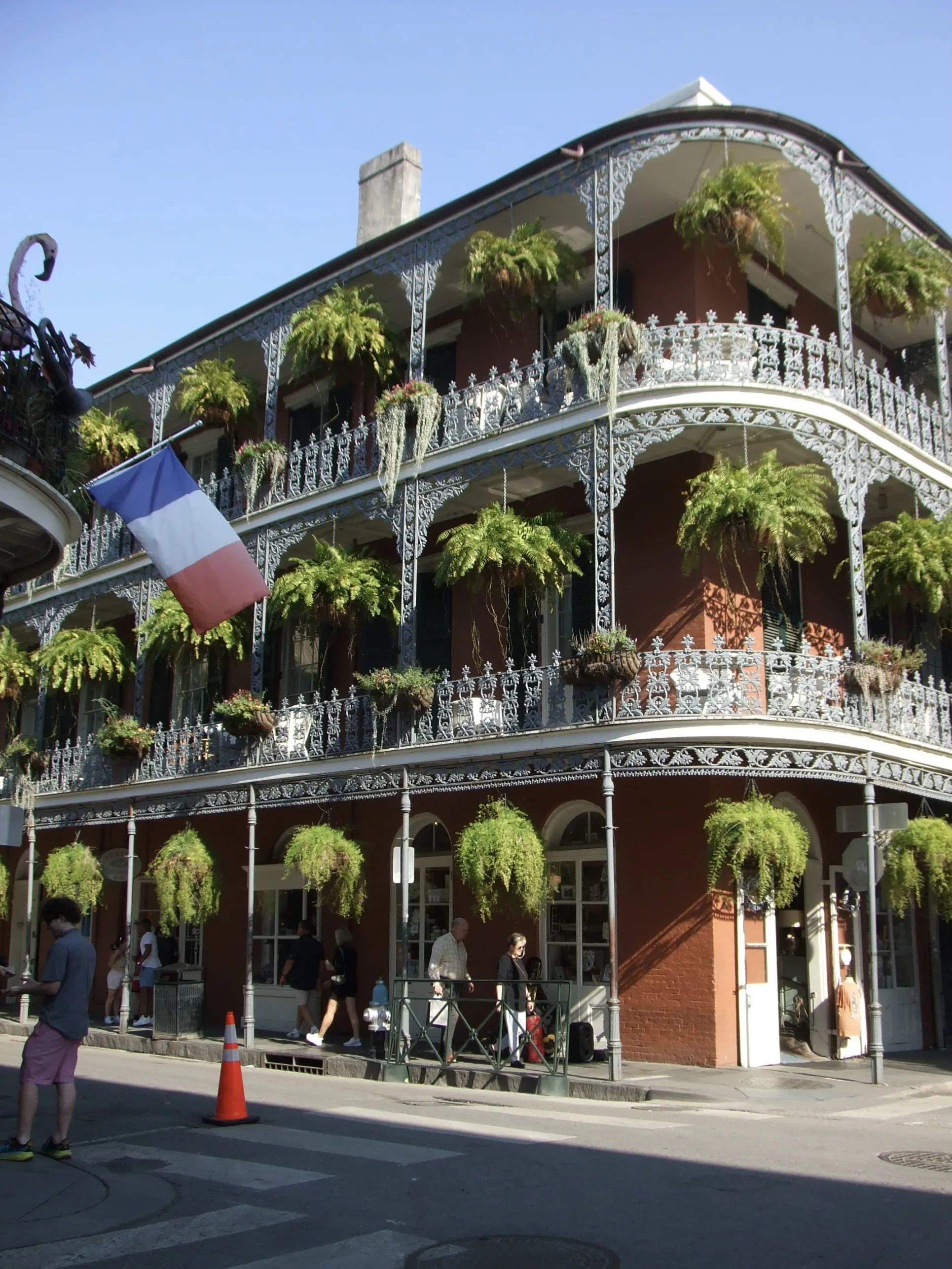 an image of a hotel with colonial-style architecture from the famous French Quarter of New Orleans