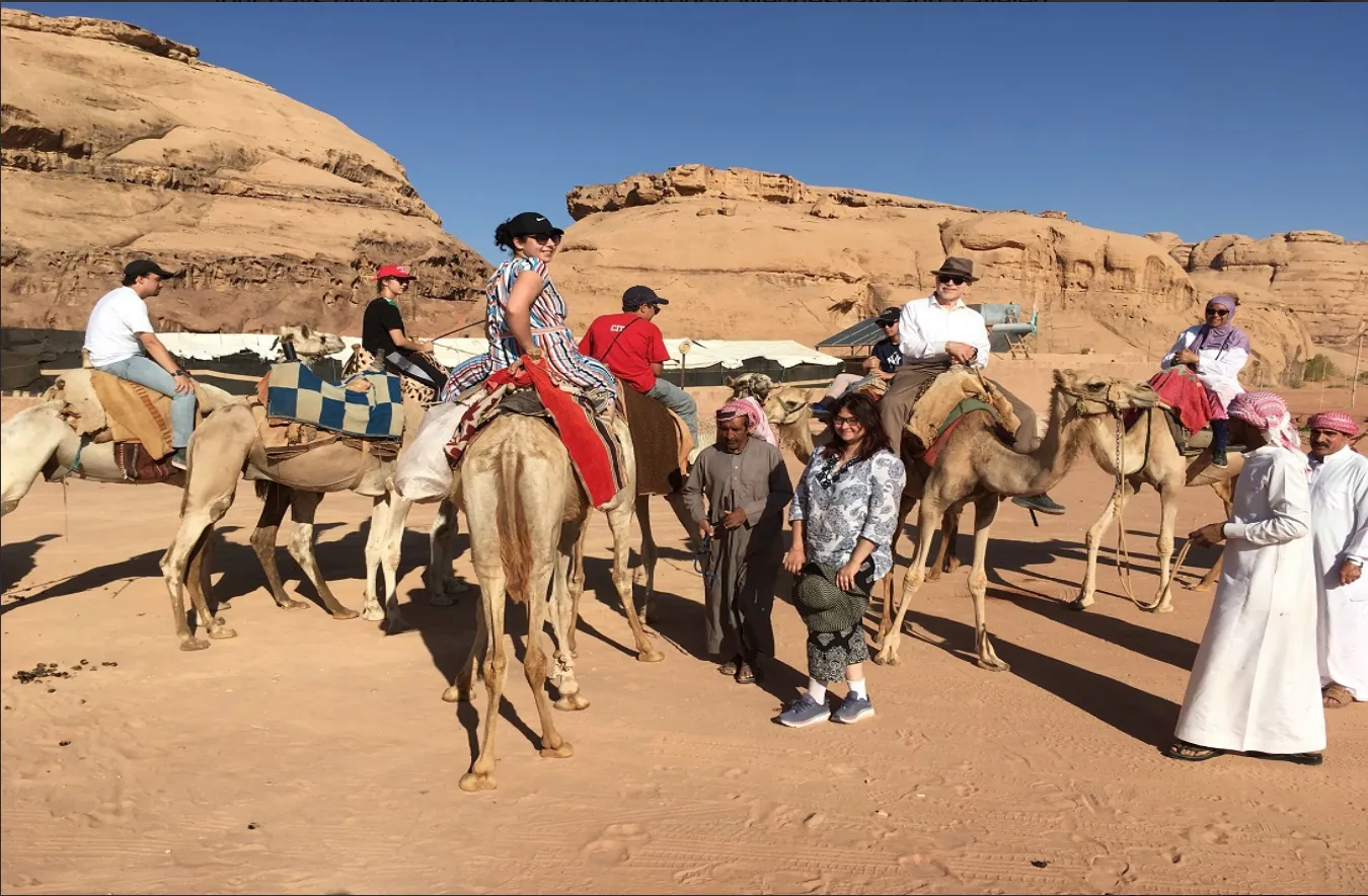 Bryn Mawr College Students abroad ride camels in Jordan