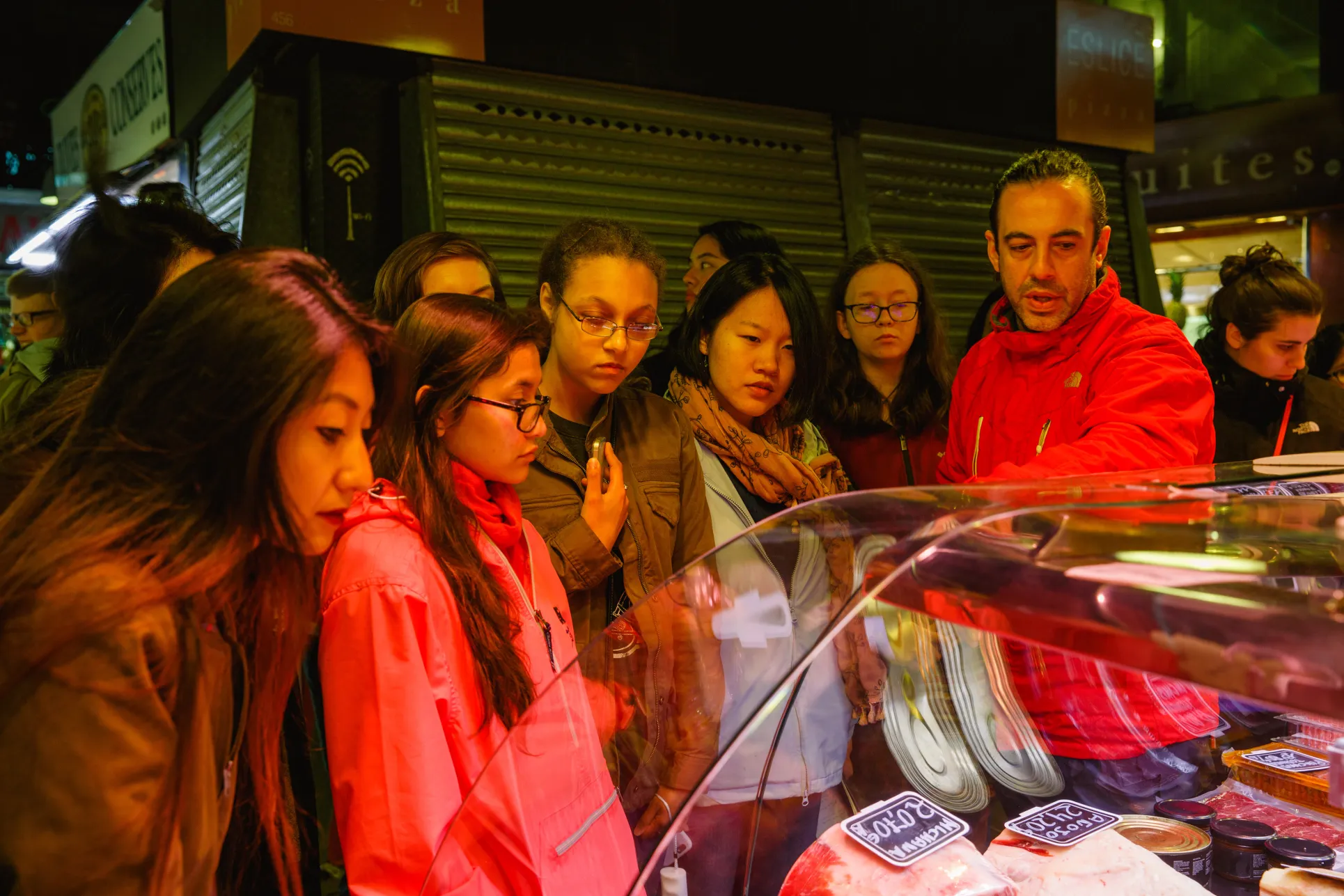 A group of Bryn Mawr College students visit a market in Barcelona