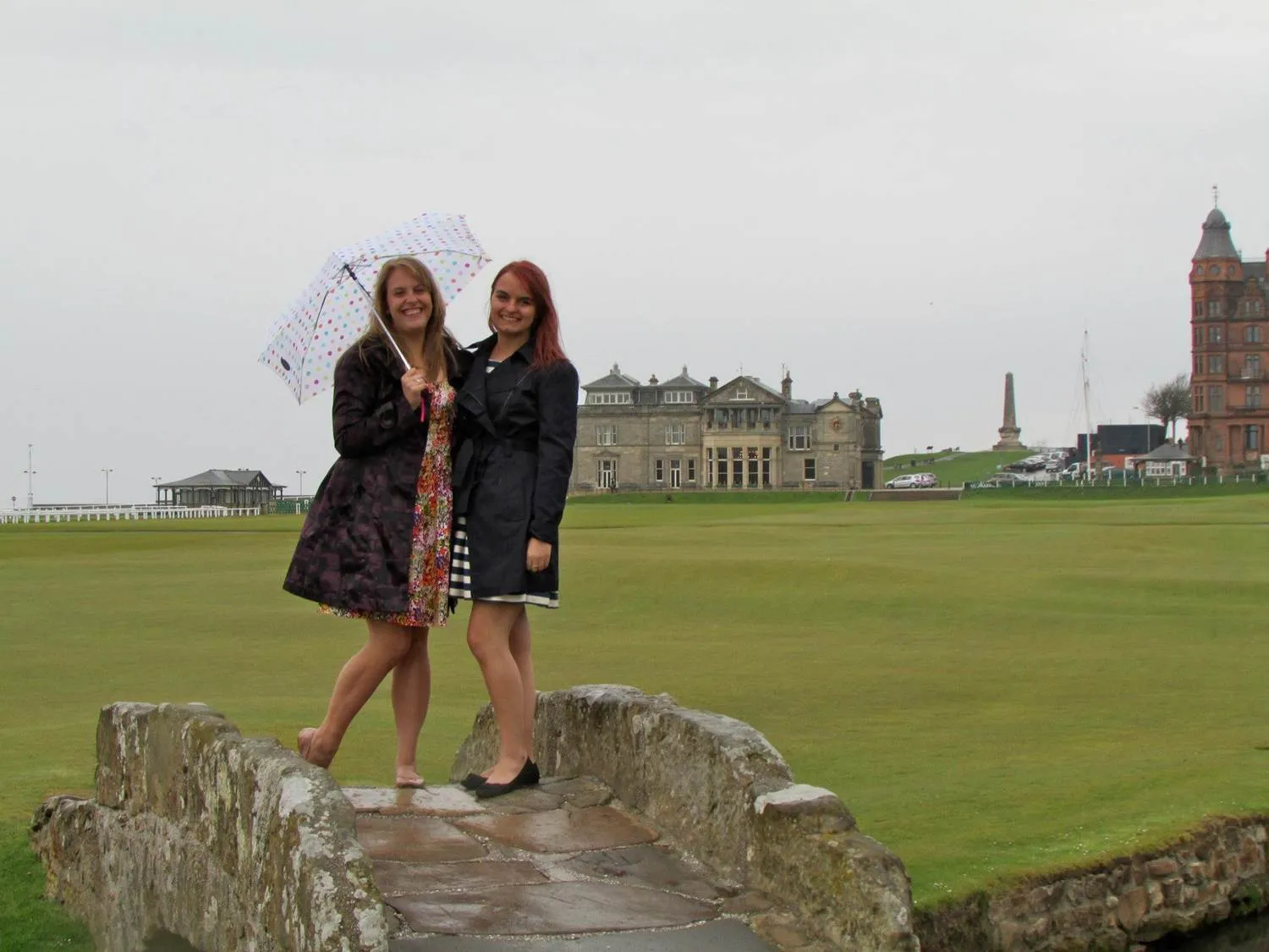 Two Bryn Mawr College Students pose at Saint Andrews gold course while studying abroad in Scotland