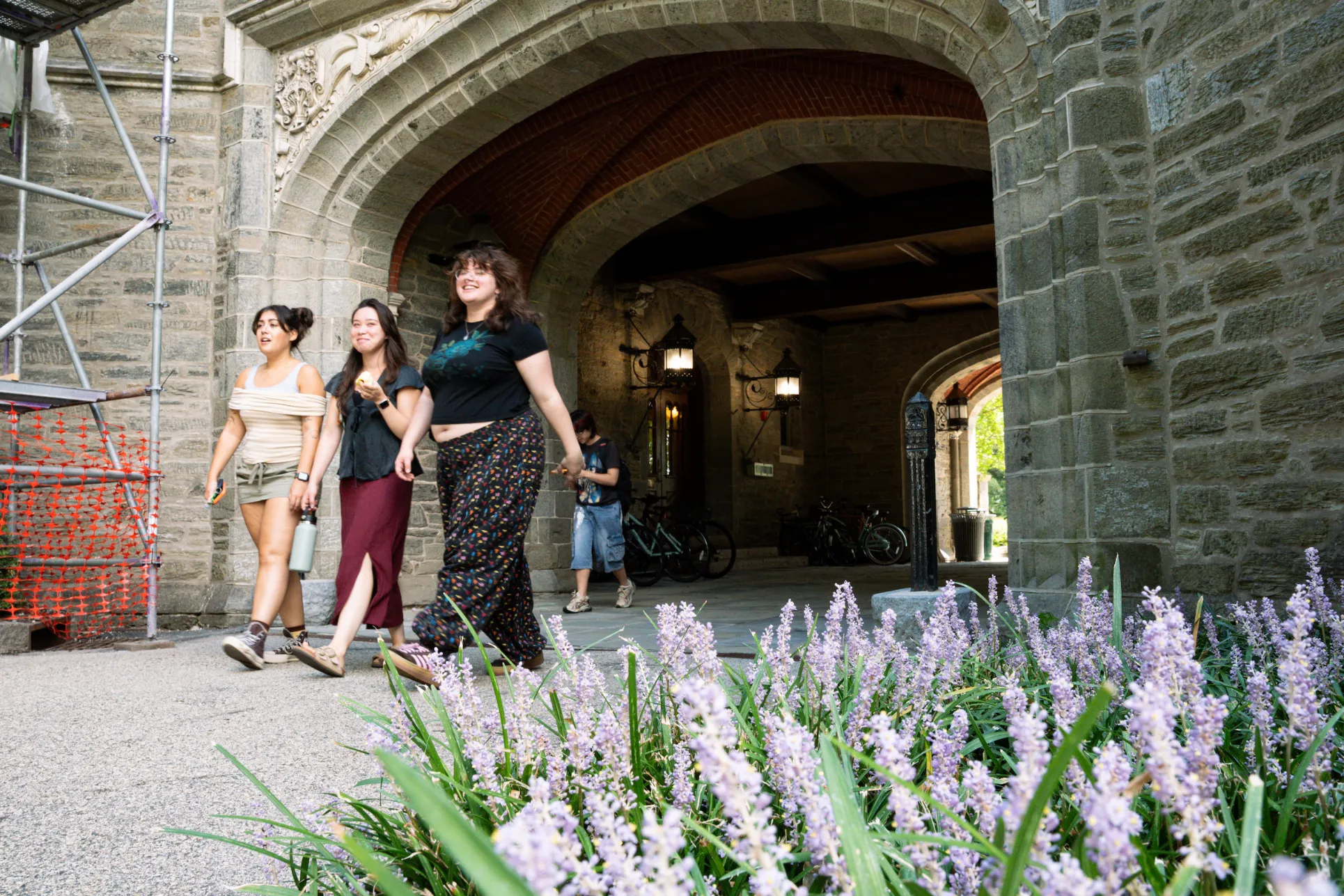 students walking through Pem arch