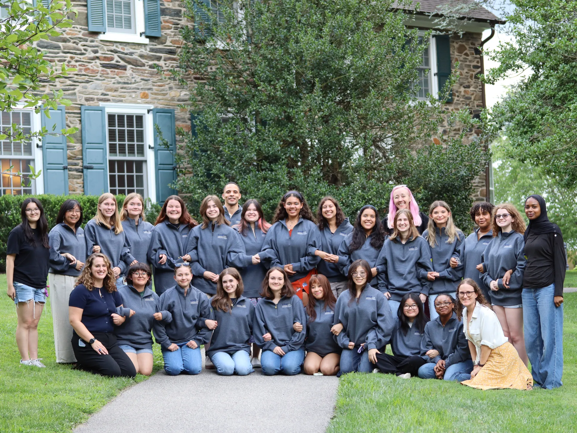 STEMLA Fellows pose in their new STEMLA sweatshirts