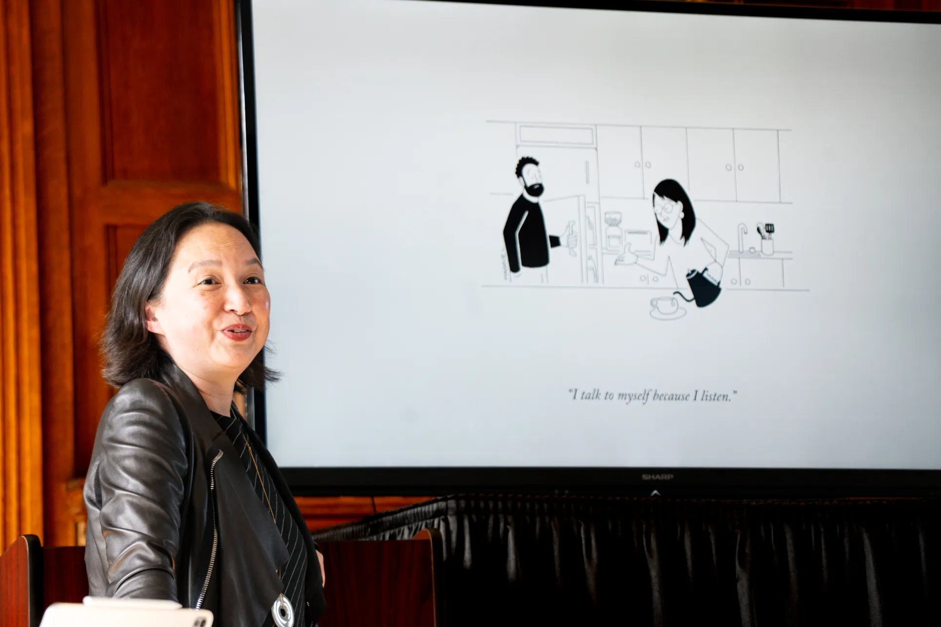 Professor Shiamin Kwa presents at the Cartoon Workshop. Photo by Caroline Bittenbender.