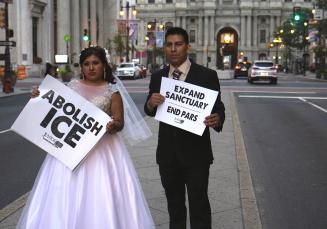 Protesters in wedding clothes 