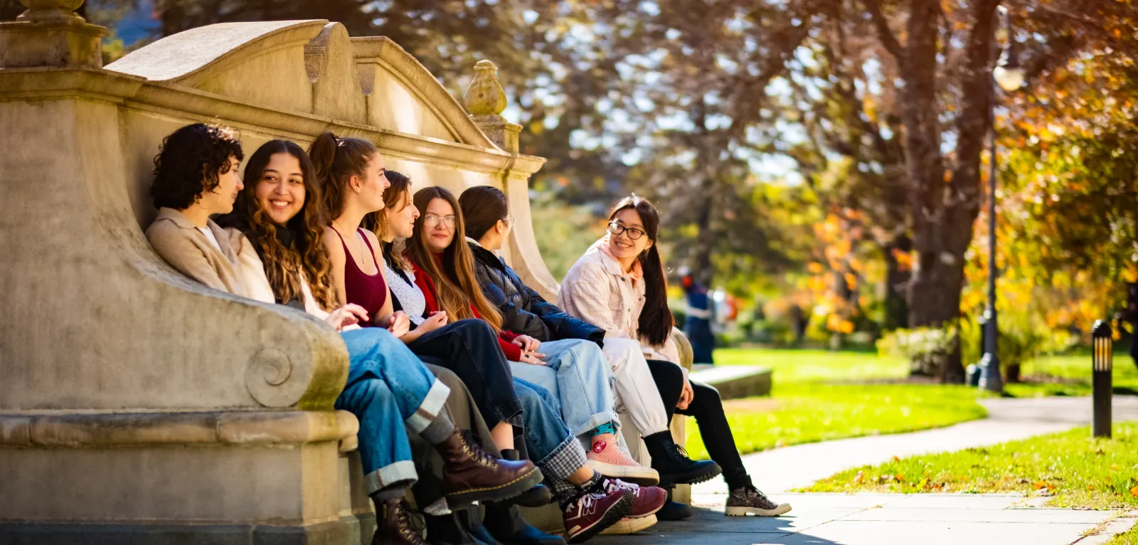 students-sitting-moon-bench