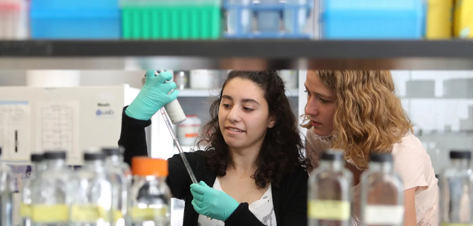 Julianna & Emma in a lab