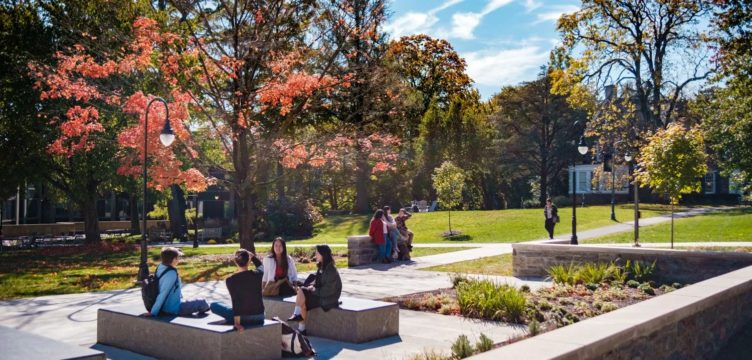 Student on campus in the fall resized