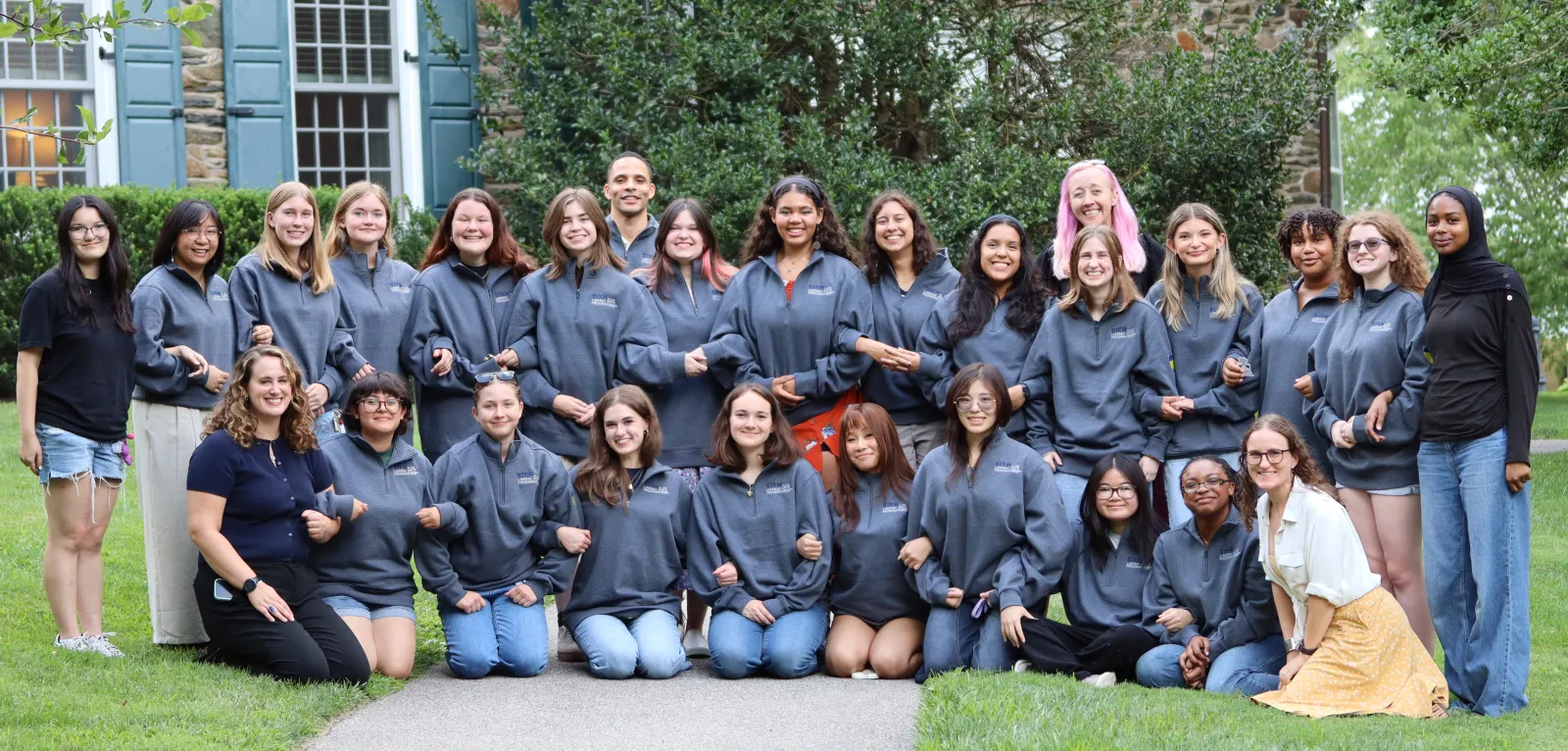 STEMLA fellows line up for a picture in their new STEMLA sweatshirts at the conclusion of the 2026 summer immersion program.