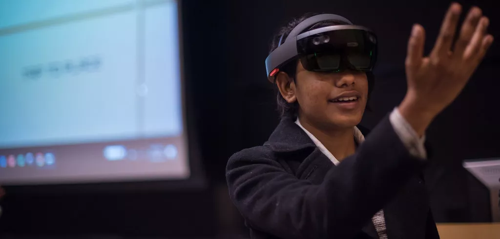 Student wears a mixed-reality headset