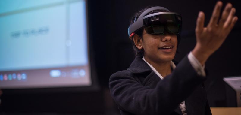 Student wears a mixed-reality headset