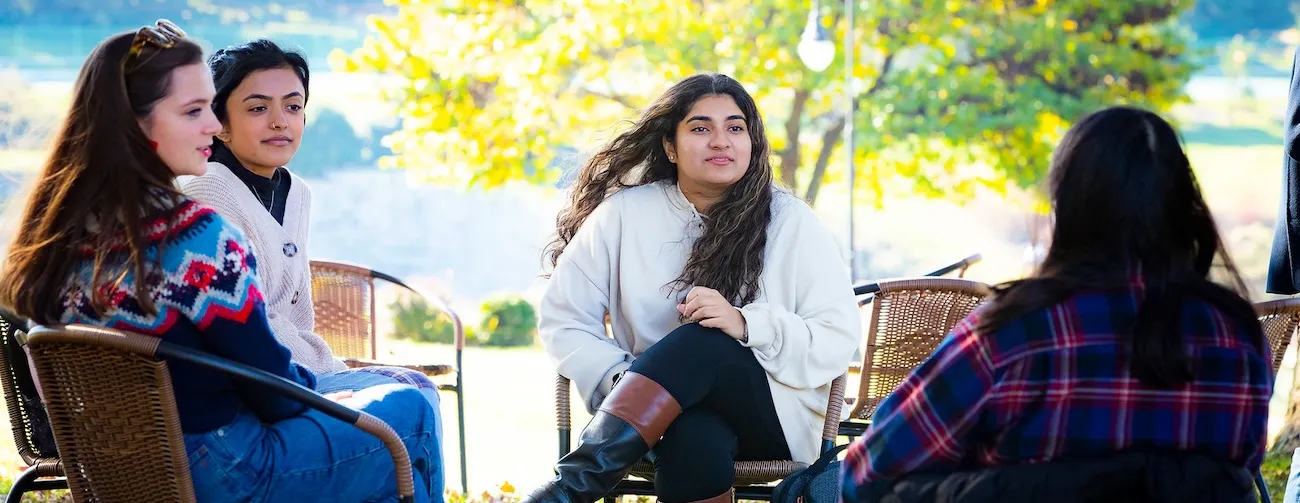 Students sitting on Merion Green