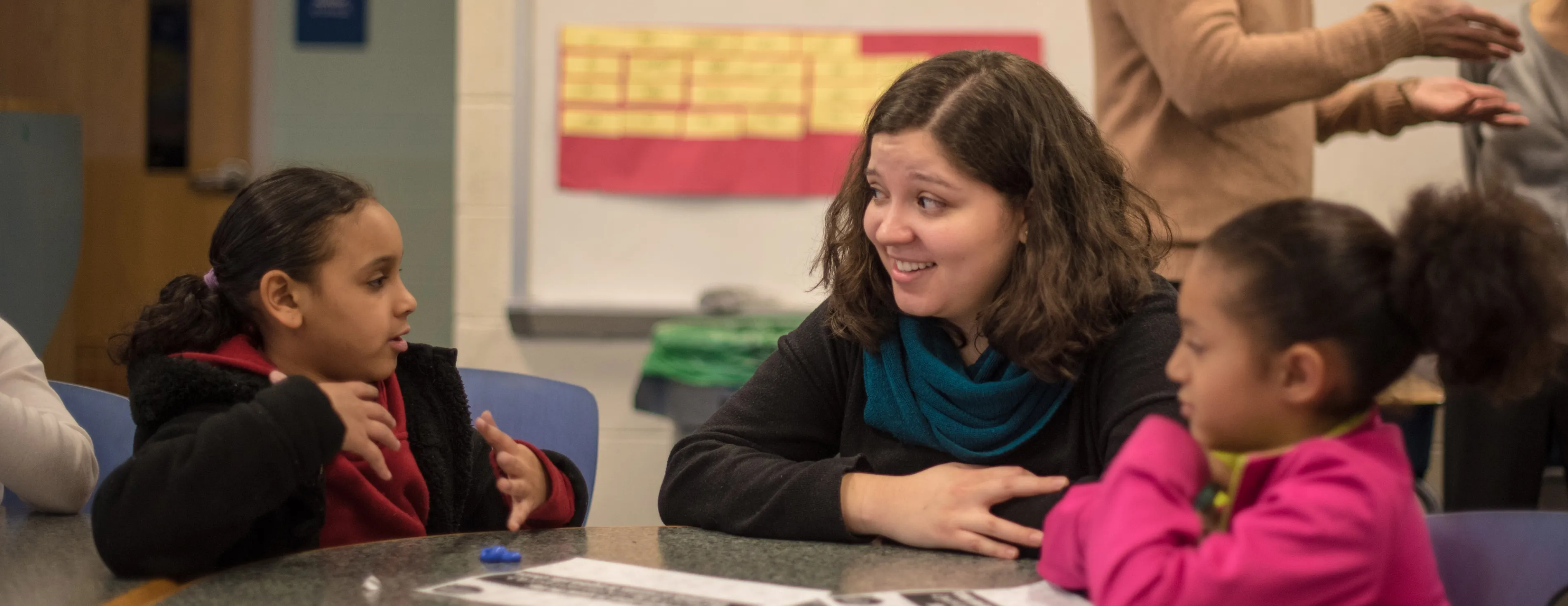 A bryn mawr college education major works with students