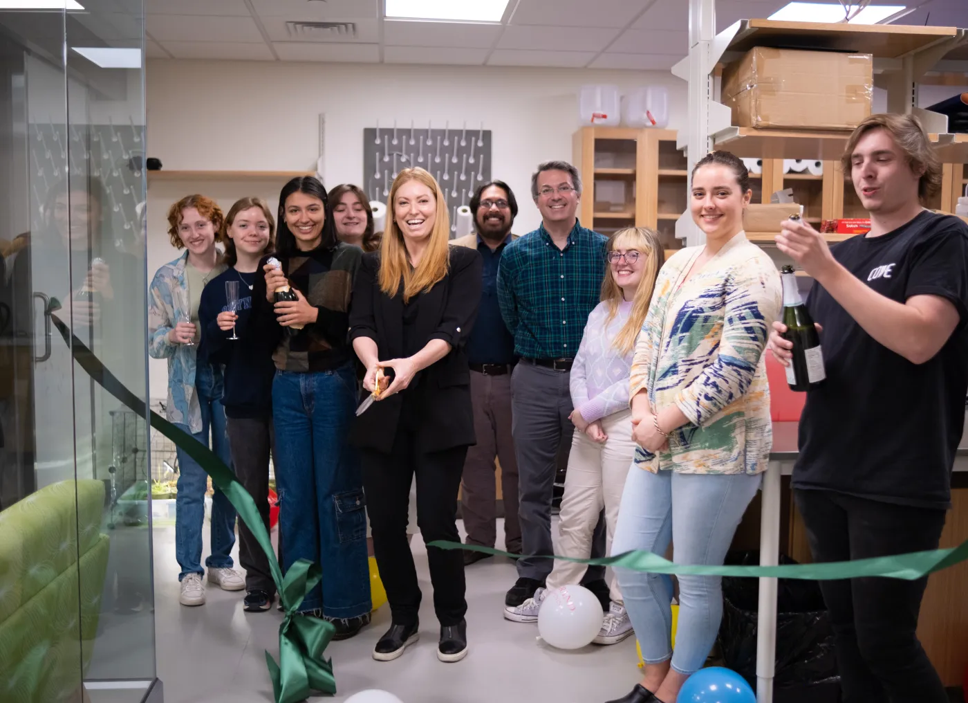 Asja Radja with students at lab opening