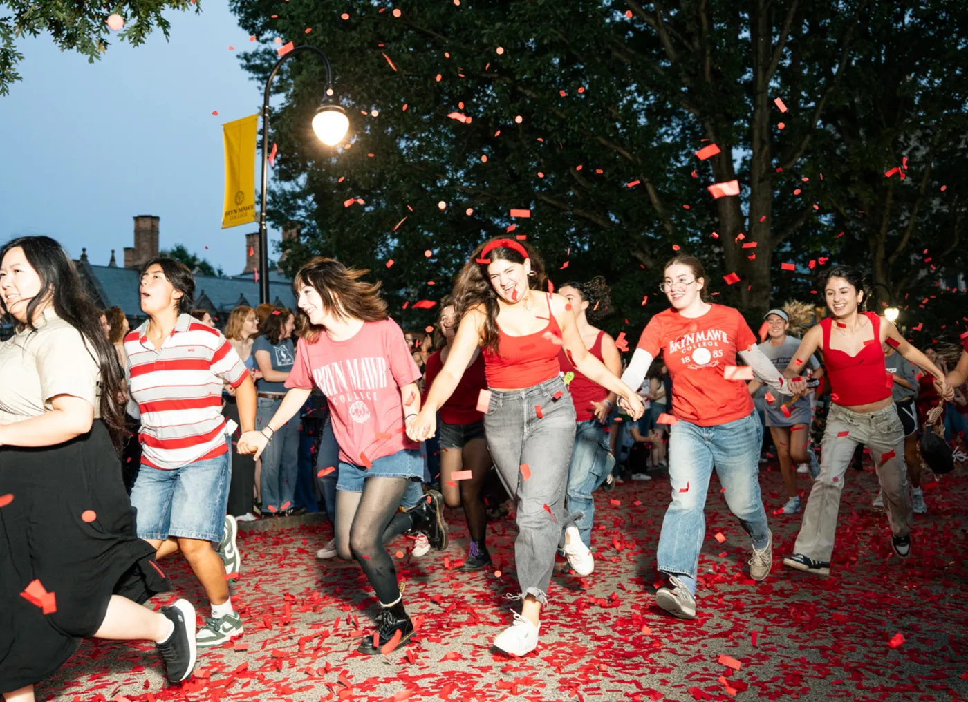 Students running at parade night at Bryn Mawr College, a top liberal arts college in Pennsylvania.