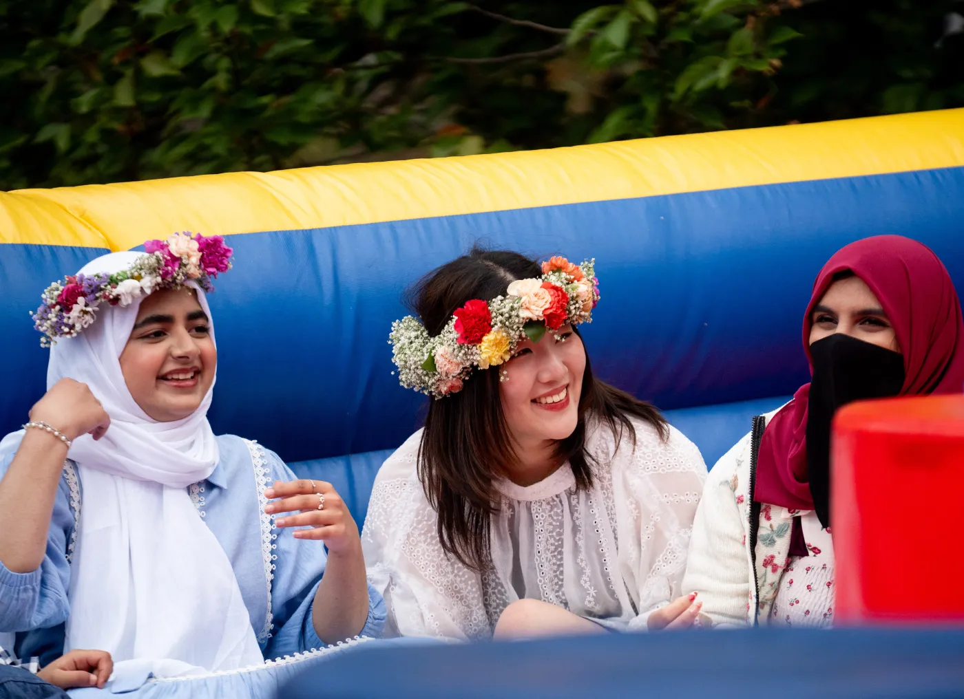 Bryn Mawr May Day students in a bouncy house